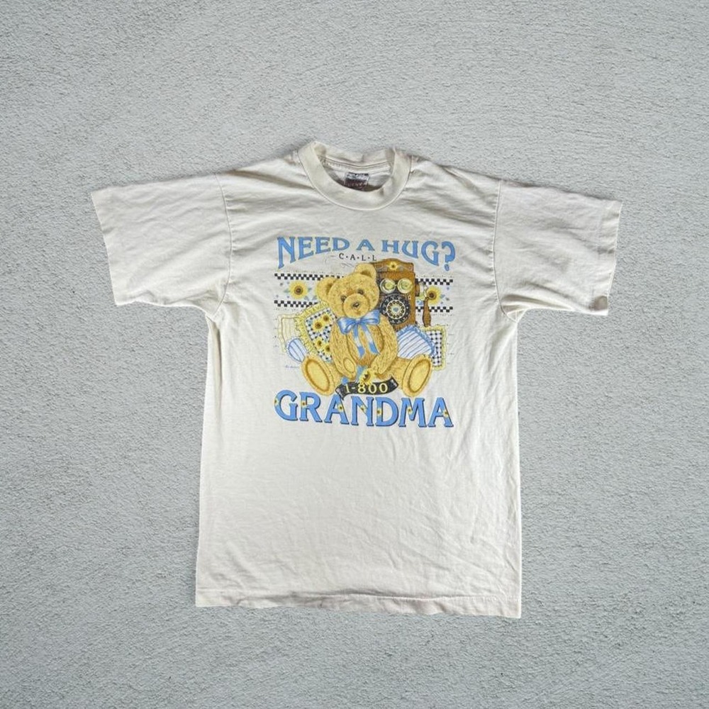 90s Grandma Hug T-Shirt with graphic of a teddy bear holding a camera